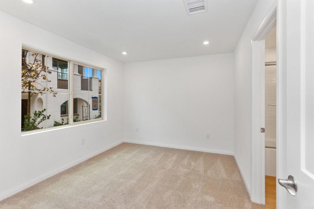 1532 Redbud Way Oceanside, CA 92056 - Photo 23 of 40 a view of an empty room with a window