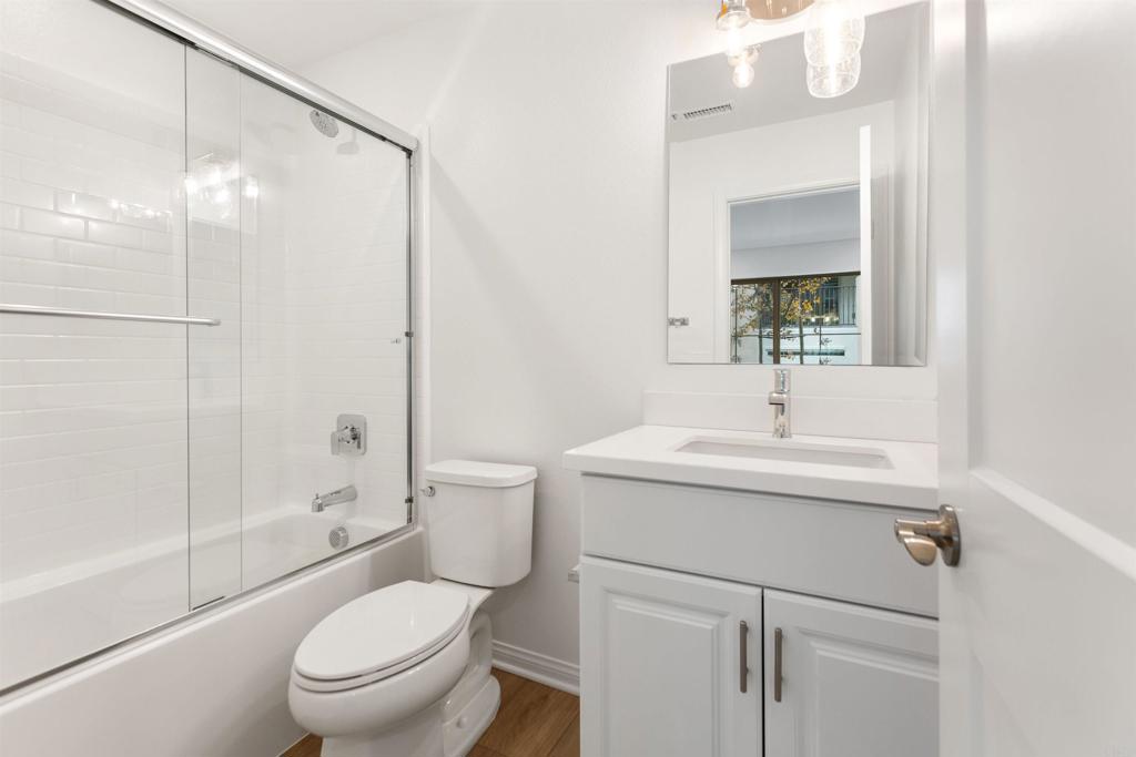 1532 Redbud Way Oceanside, CA 92056 - Photo 24 of 40 a bathroom with a sink toilet and shower