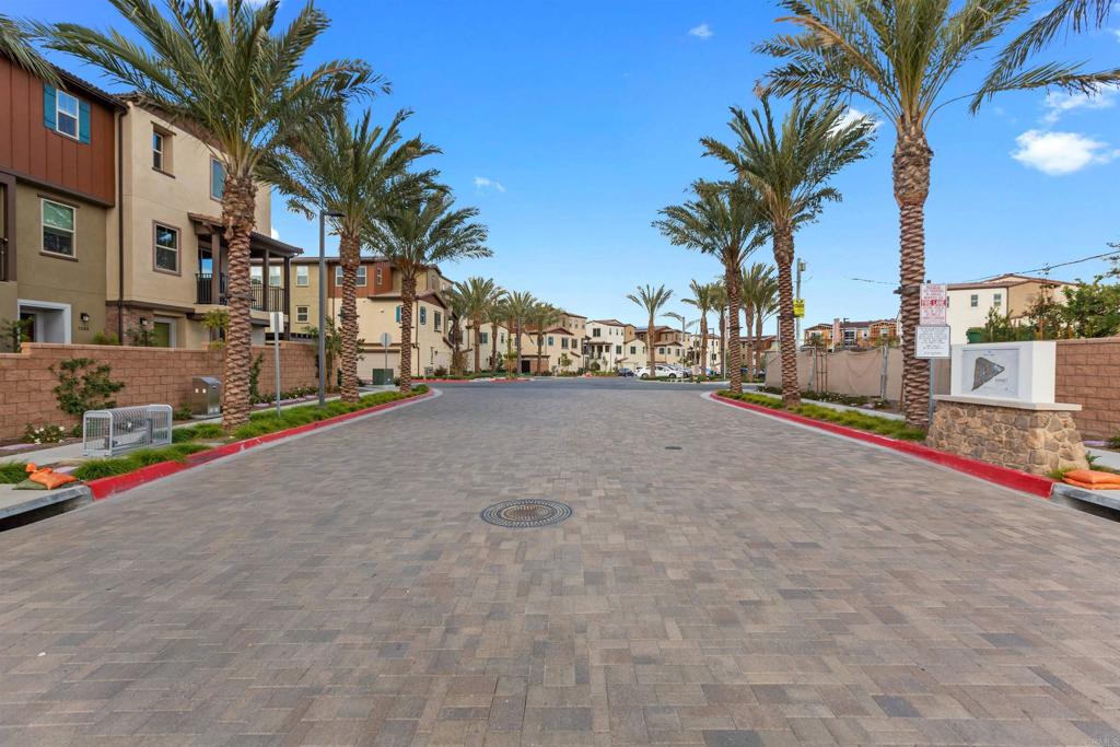 1532 Redbud Way Oceanside, CA 92056 - Photo 37 of 40 a view of a street with palm trees