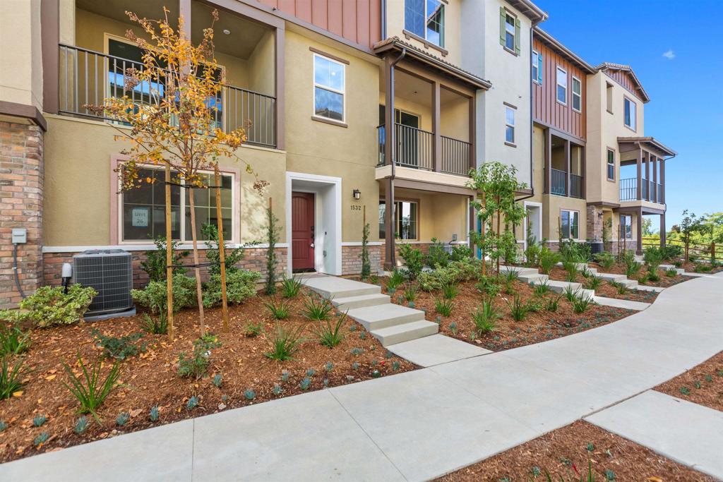 1532 Redbud Way Oceanside, CA 92056 - Photo 39 of 40 a view of a building with a patio