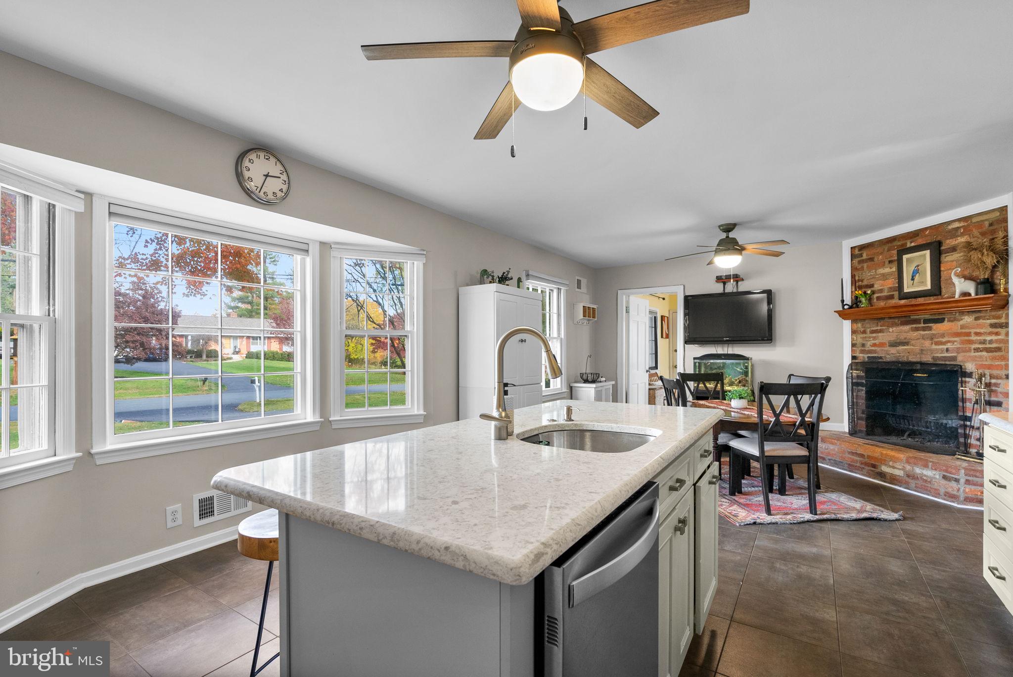 14530 Sturtevant Road Silver Spring, MD 20905 - Photo 12 of 47 a dining table with chairs and a large window