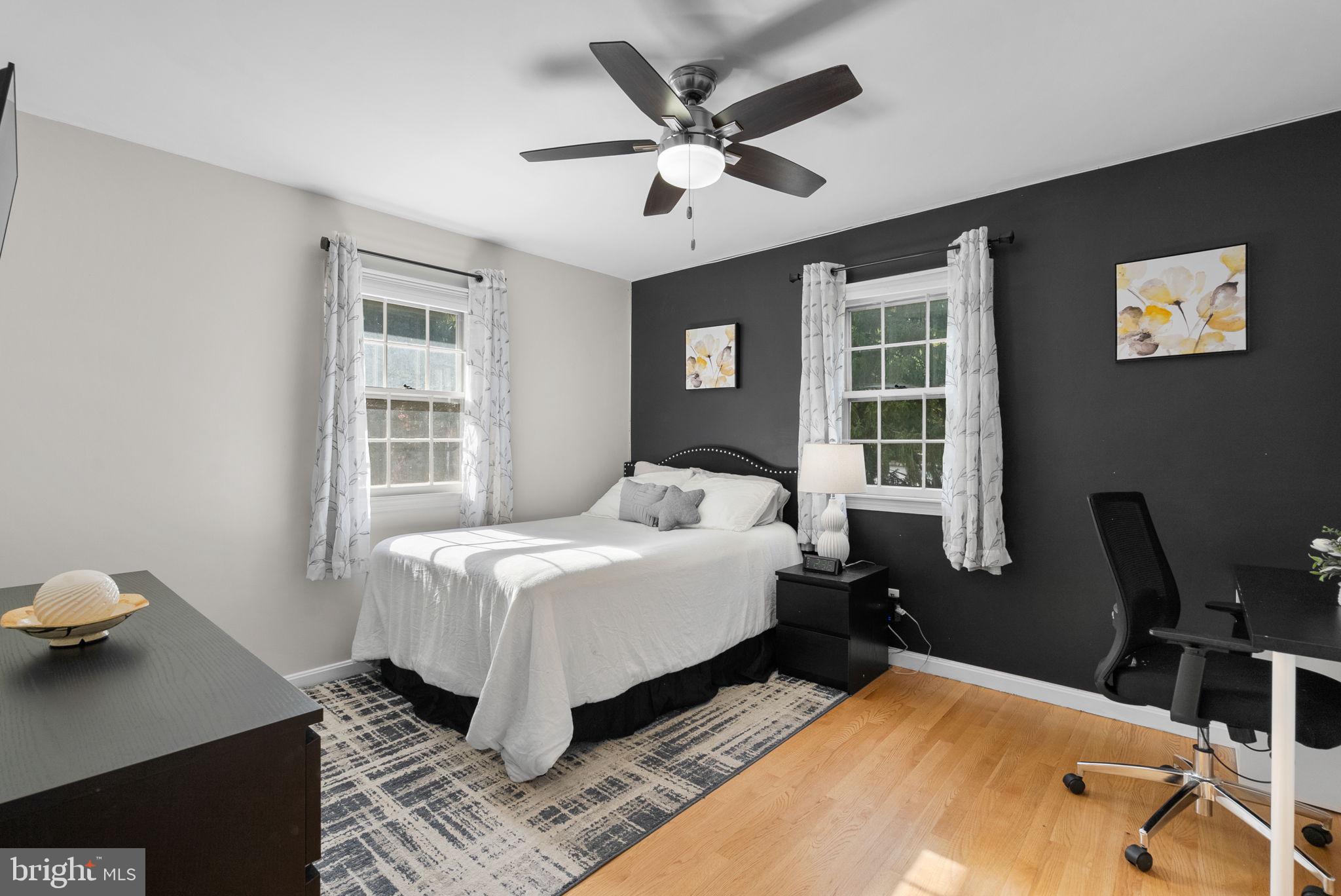 14530 Sturtevant Road Silver Spring, MD 20905 - Photo 22 of 47 a bed room with a bed and a window