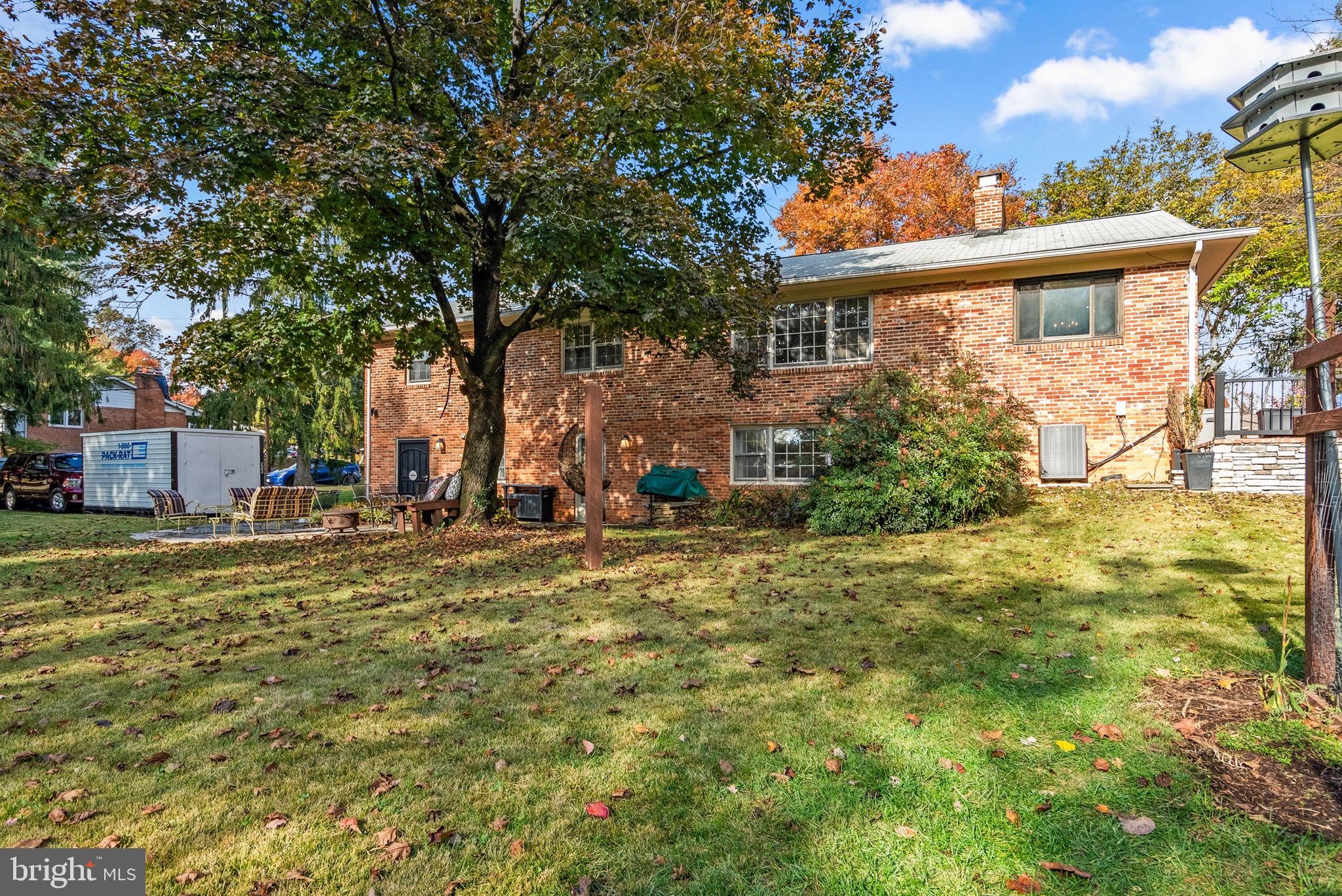 14530 Sturtevant Road Silver Spring, MD 20905 - Photo 45 of 47 a front view of a house with a garden