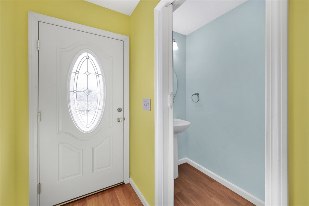 353 Fuller Street, Unit 8 Ludlow, MA 01056 - Photo 15 of 41 a view of front door with wooden floor