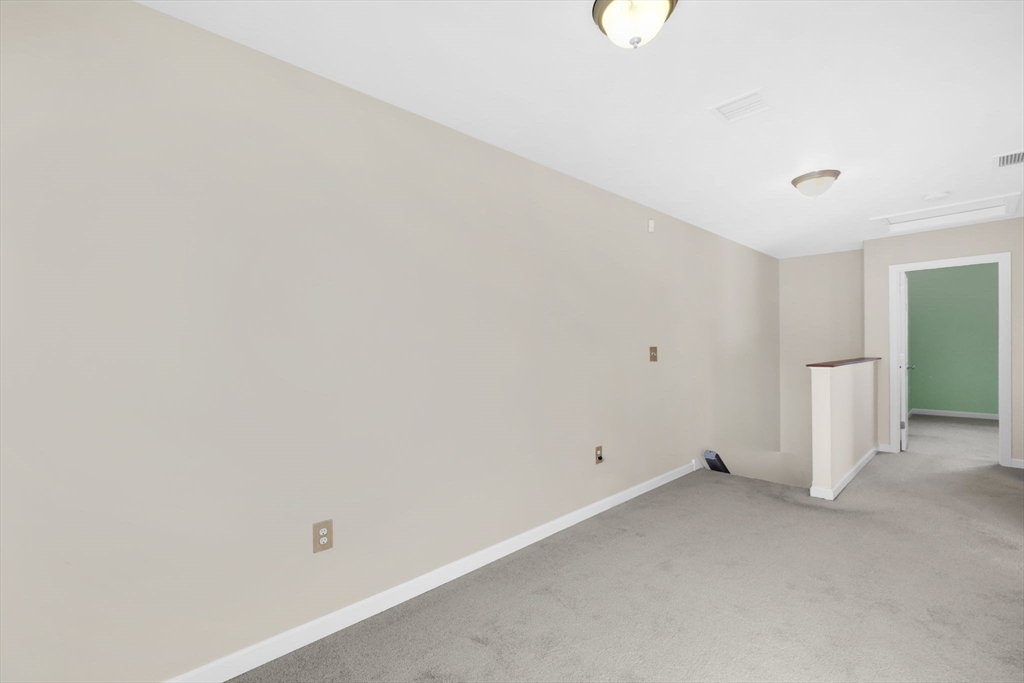 353 Fuller Street, Unit 8 Ludlow, MA 01056 - Photo 21 of 41 a view of an empty room