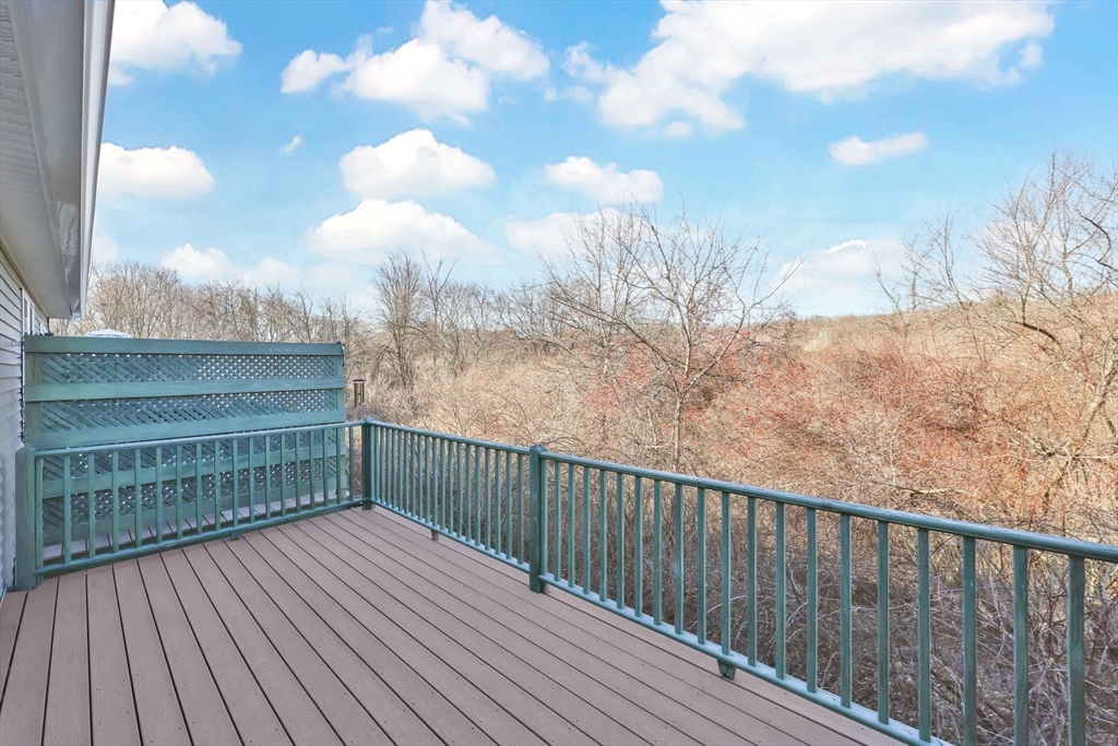 353 Fuller Street, Unit 8 Ludlow, MA 01056 - Photo 36 of 41 a view of balcony with wooden floor