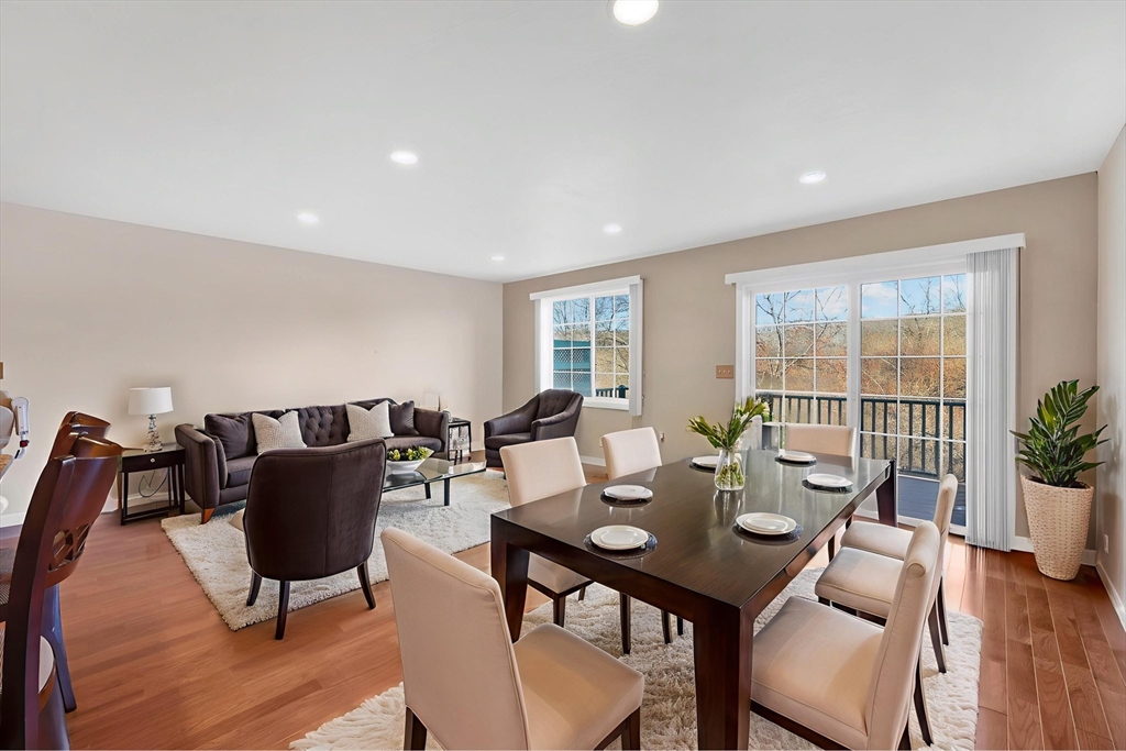 353 Fuller Street, Unit 8 Ludlow, MA 01056 - Photo 9 of 41 a living room with furniture and wooden floor