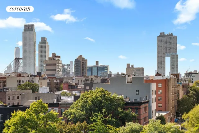a view of a city with tall buildings