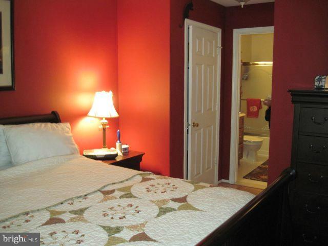 131 Fort Evans Road Southeast, Unit E Leesburg, VA 20175 - Photo 13 of 23 Bedroom (Master) w/ Full Bath, Walk-in Closet