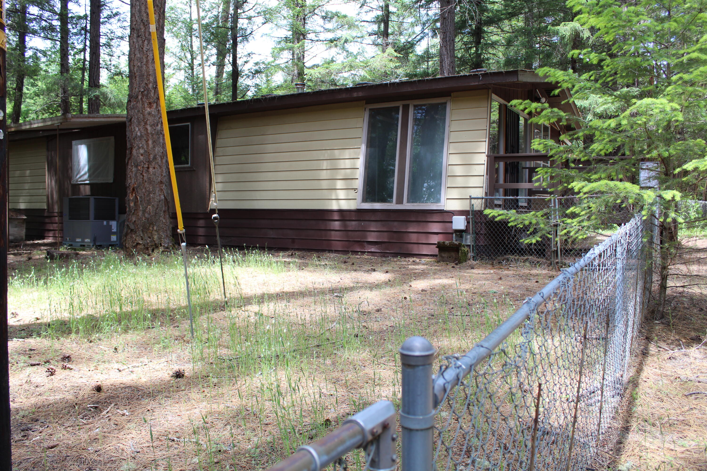 820 Queens Branch Road Rogue River, OR 97537 - Photo 29 of 32 a backyard of a house with lots of green space
