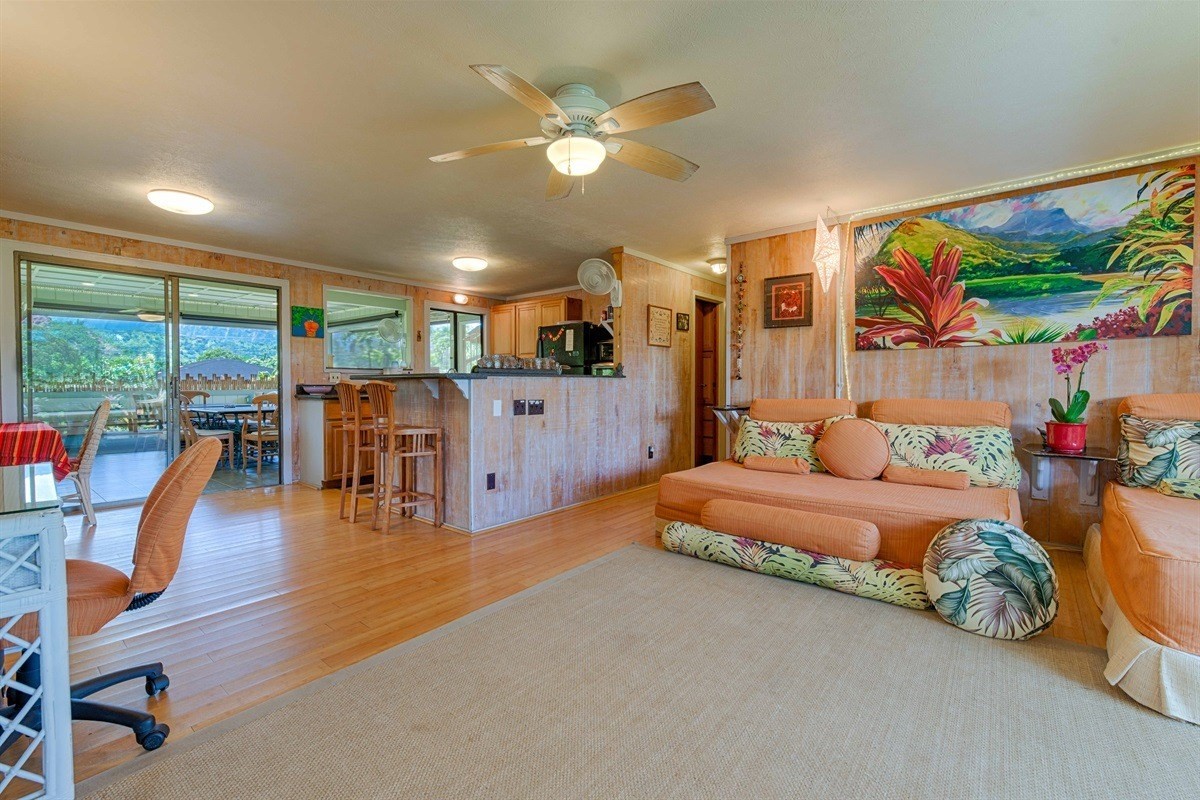 4467 Mahimahi Road Hanalei, HI 96714 - Photo 8 of 30 a living room with furniture and wooden floor