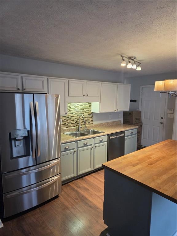 2549 Rainbow Creek Drive Decatur, GA 30034 - Photo 16 of 57 a kitchen with granite countertop stainless steel appliances and wooden cabinets