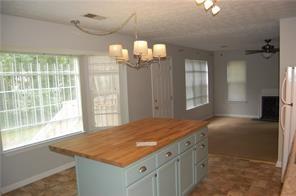 2549 Rainbow Creek Drive Decatur, GA 30034 - Photo 17 of 57 a room with a bed and a chandelier