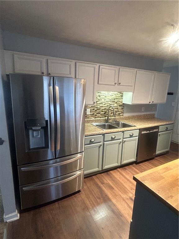 2549 Rainbow Creek Drive Decatur, GA 30034 - Photo 18 of 57 a kitchen with stainless steel appliances granite countertop a refrigerator and a stove top oven