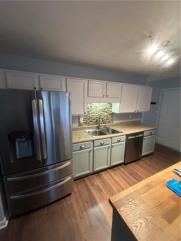 2549 Rainbow Creek Drive Decatur, GA 30034 - Photo 19 of 57 a kitchen with stainless steel appliances granite countertop a refrigerator and a sink