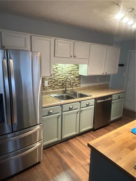 2549 Rainbow Creek Drive Decatur, GA 30034 - Photo 23 of 57 a kitchen with granite countertop stainless steel appliances and wooden cabinets