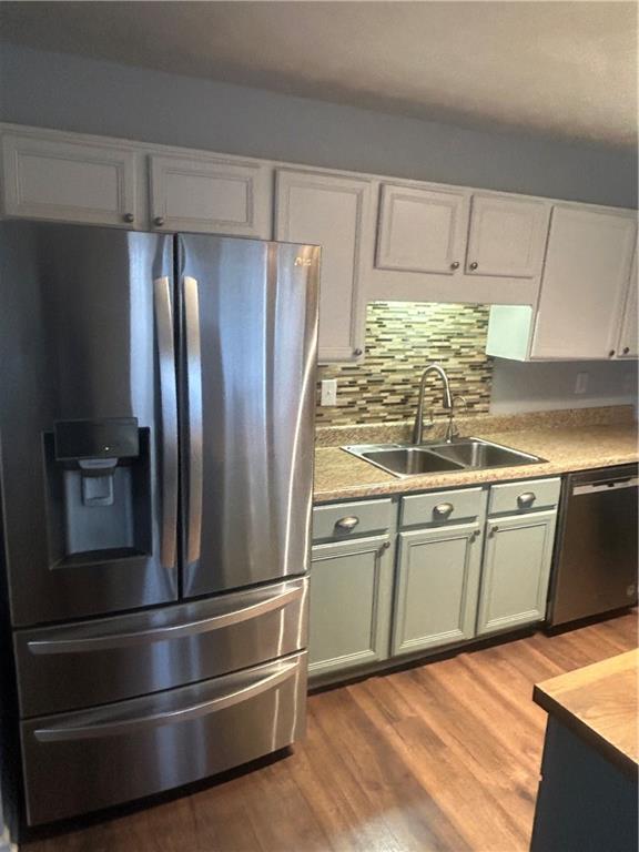2549 Rainbow Creek Drive Decatur, GA 30034 - Photo 24 of 57 a kitchen with granite countertop stainless steel appliances and wooden cabinets