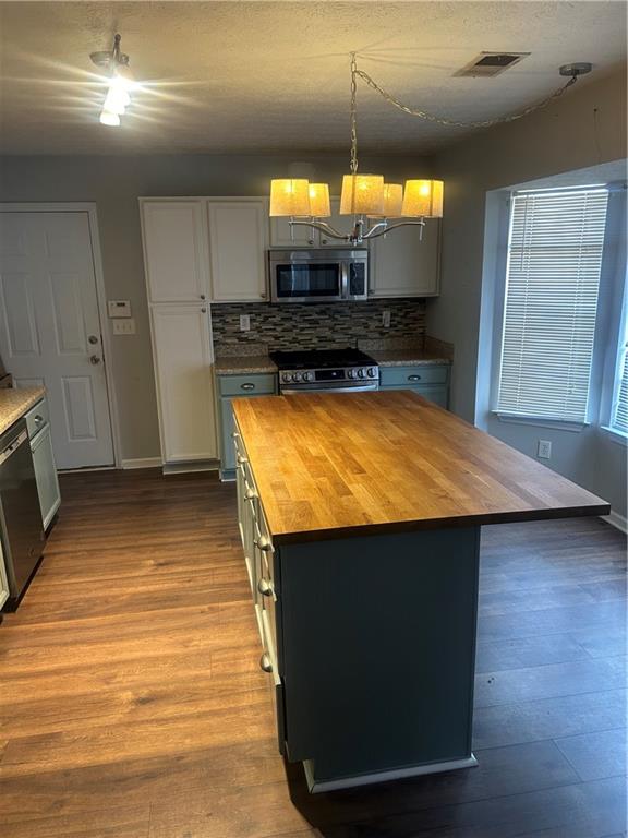 2549 Rainbow Creek Drive Decatur, GA 30034 - Photo 27 of 57 a view of a kitchen with a sink and dishwasher a microwave oven