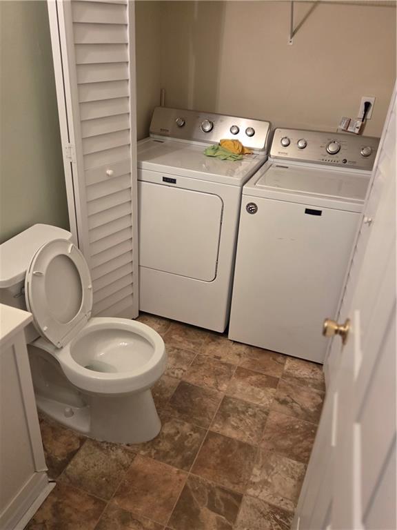 2549 Rainbow Creek Drive Decatur, GA 30034 - Photo 29 of 57 a bathroom with a sink toilet and vanity
