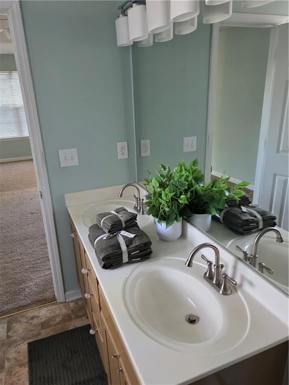 2549 Rainbow Creek Drive Decatur, GA 30034 - Photo 38 of 57 a bathroom with a sink and a mirror