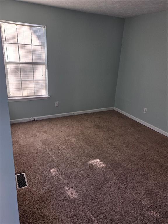 2549 Rainbow Creek Drive Decatur, GA 30034 - Photo 41 of 57 an empty room with a window