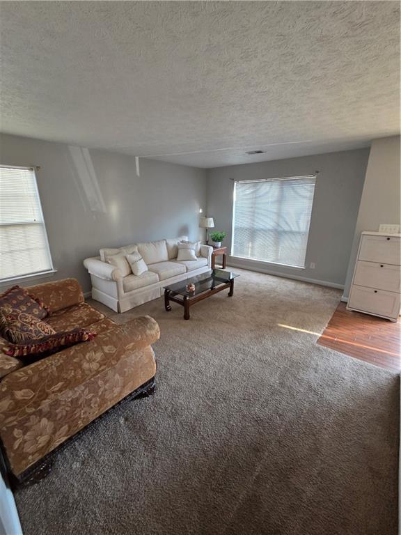 2549 Rainbow Creek Drive Decatur, GA 30034 - Photo 8 of 57 a living room with furniture and a window