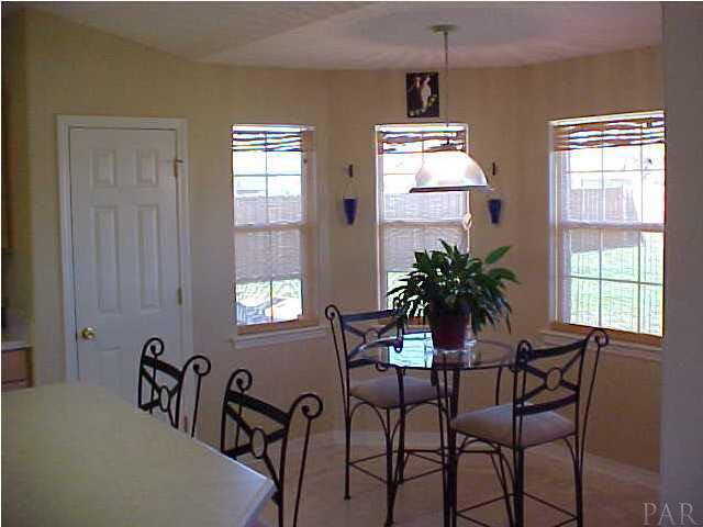 7155 Jennifer Road Pensacola, FL 32526 - Photo 5 of 14 PERFECT EAT IN KITCHEN WITH LOTS OF LIGHT..