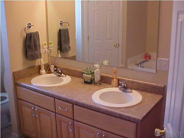 7155 Jennifer Road Pensacola, FL 32526 - Photo 9 of 14 DOUBLE VANTIES ARE ANOTHER NICE ITEM IN MASTER BATH...