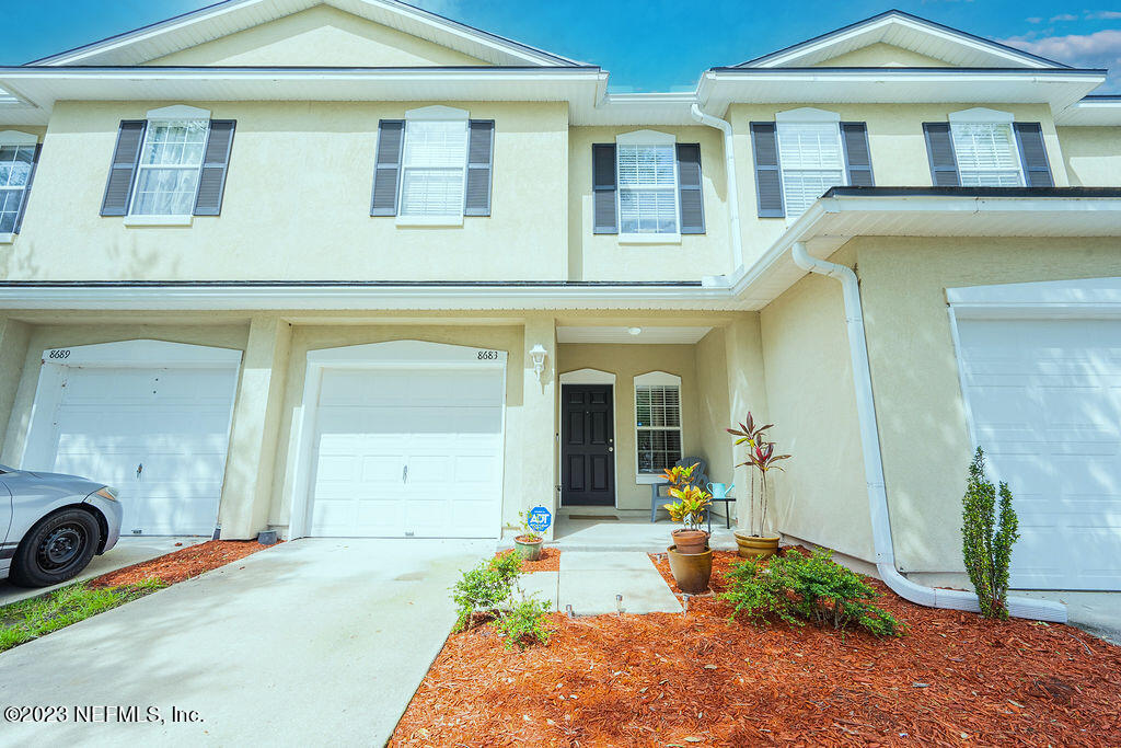 a front view of a house with an outdoor space