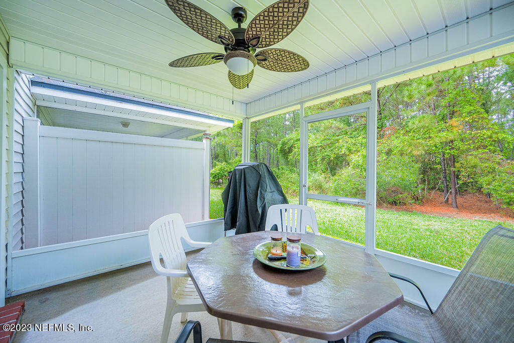 8683 Ribbon Falls Lane Jacksonville, FL 32244 - Photo 11 of 43 a view of a dining room with furniture window and outside view