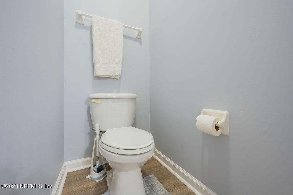 8683 Ribbon Falls Lane Jacksonville, FL 32244 - Photo 12 of 43 a bathroom with a toilet and a sink