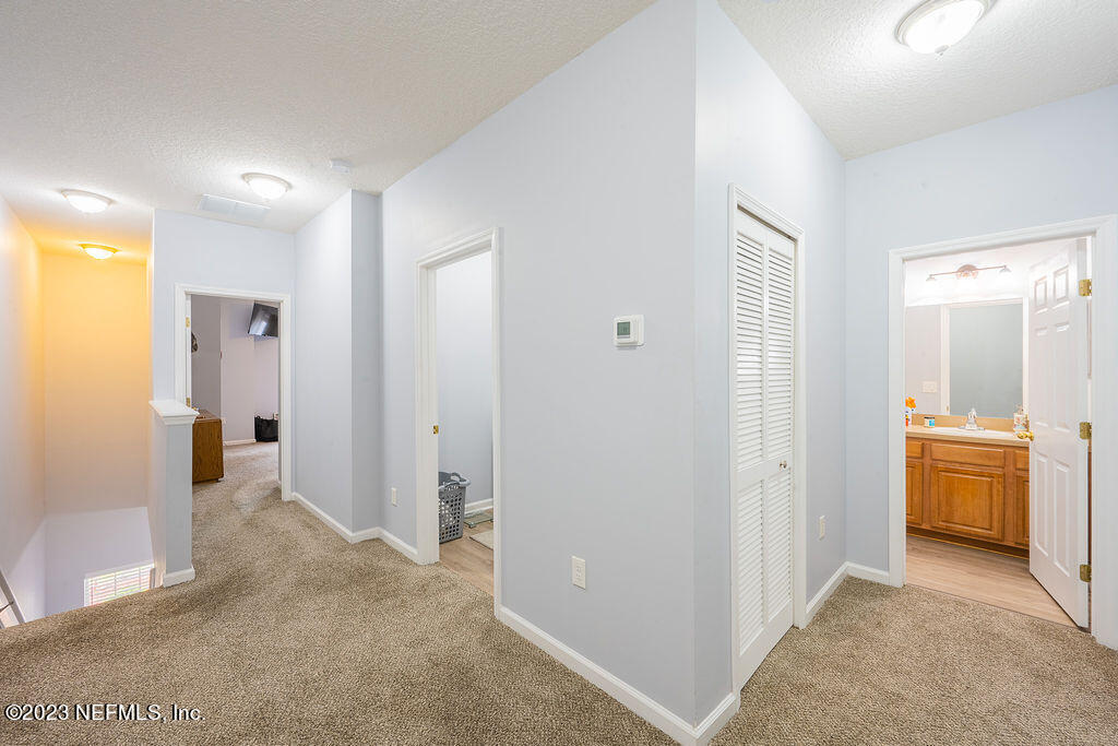 8683 Ribbon Falls Lane Jacksonville, FL 32244 - Photo 19 of 43 a view of a bathroom with tub and shower