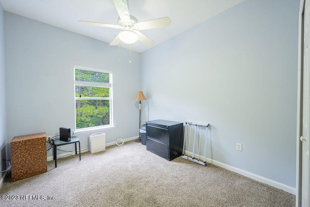 8683 Ribbon Falls Lane Jacksonville, FL 32244 - Photo 27 of 43 a view of workspace with furniture and window