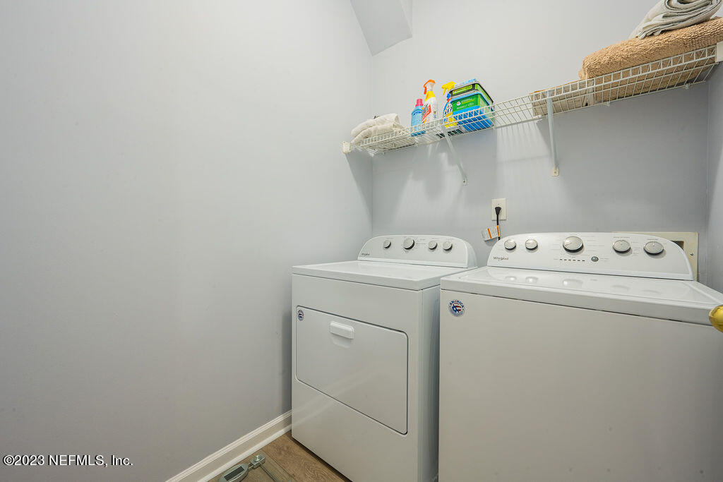 8683 Ribbon Falls Lane Jacksonville, FL 32244 - Photo 28 of 43 a utility room with dryer and washer