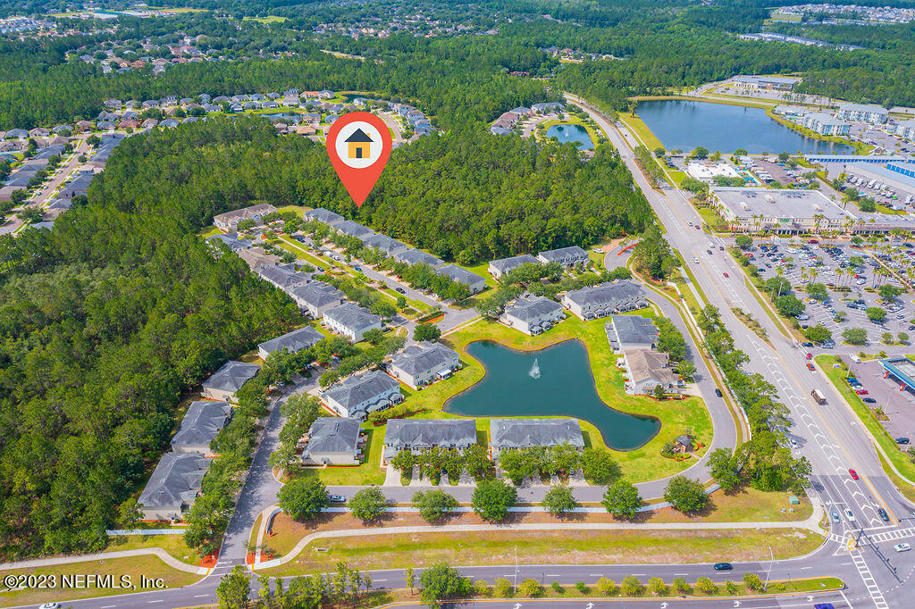 8683 Ribbon Falls Lane Jacksonville, FL 32244 - Photo 38 of 43 an aerial view of multi story residential houses with outdoor space and street view