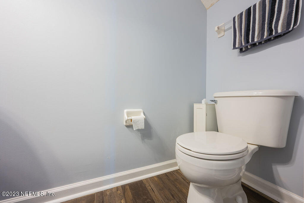 8683 Ribbon Falls Lane Jacksonville, FL 32244 - Photo 40 of 43 a bathroom with a toilet and a sink