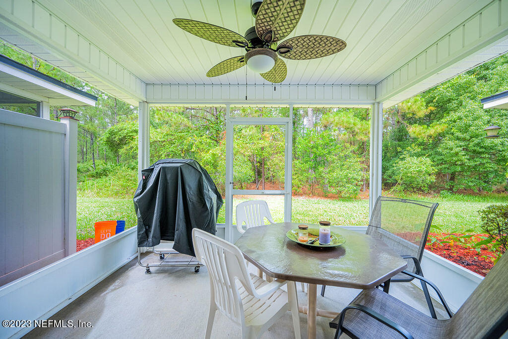 8683 Ribbon Falls Lane Jacksonville, FL 32244 - Photo 4 of 43 a view of a dining room with furniture window and a garden