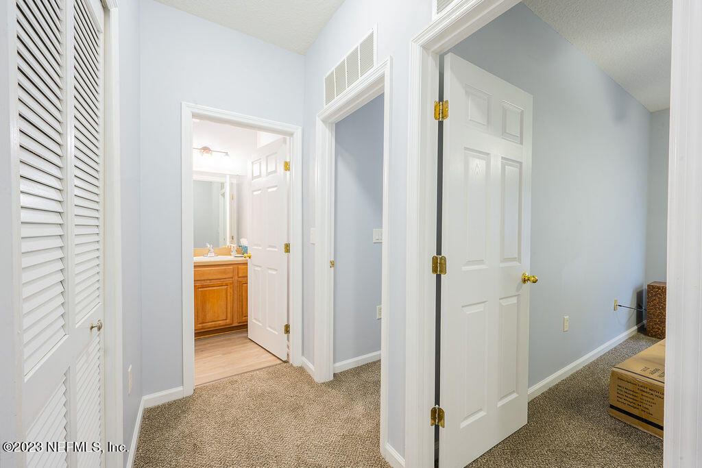 8683 Ribbon Falls Lane Jacksonville, FL 32244 - Photo 6 of 43 a view of a bathroom with tub