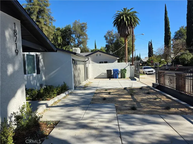 a view of a house with a patio