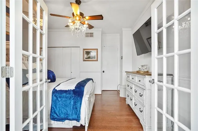 a bed room with a bed and a night stand