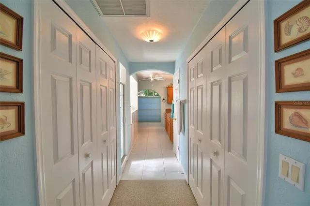 a view of a bathroom with a glass shower door
