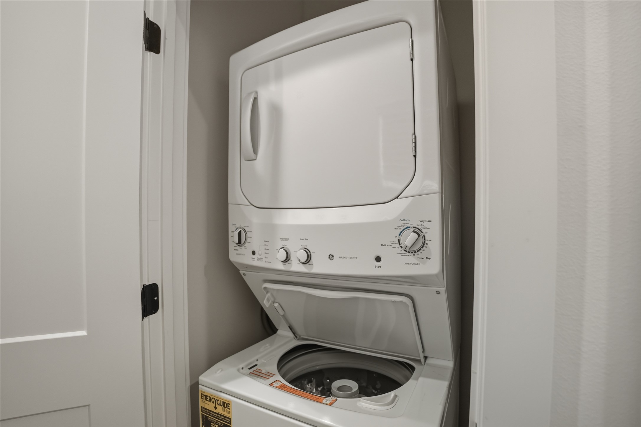 8017 Cora Street, Unit B Houston, TX 77088 - Photo 17 of 28 a utility room with dryer and washer