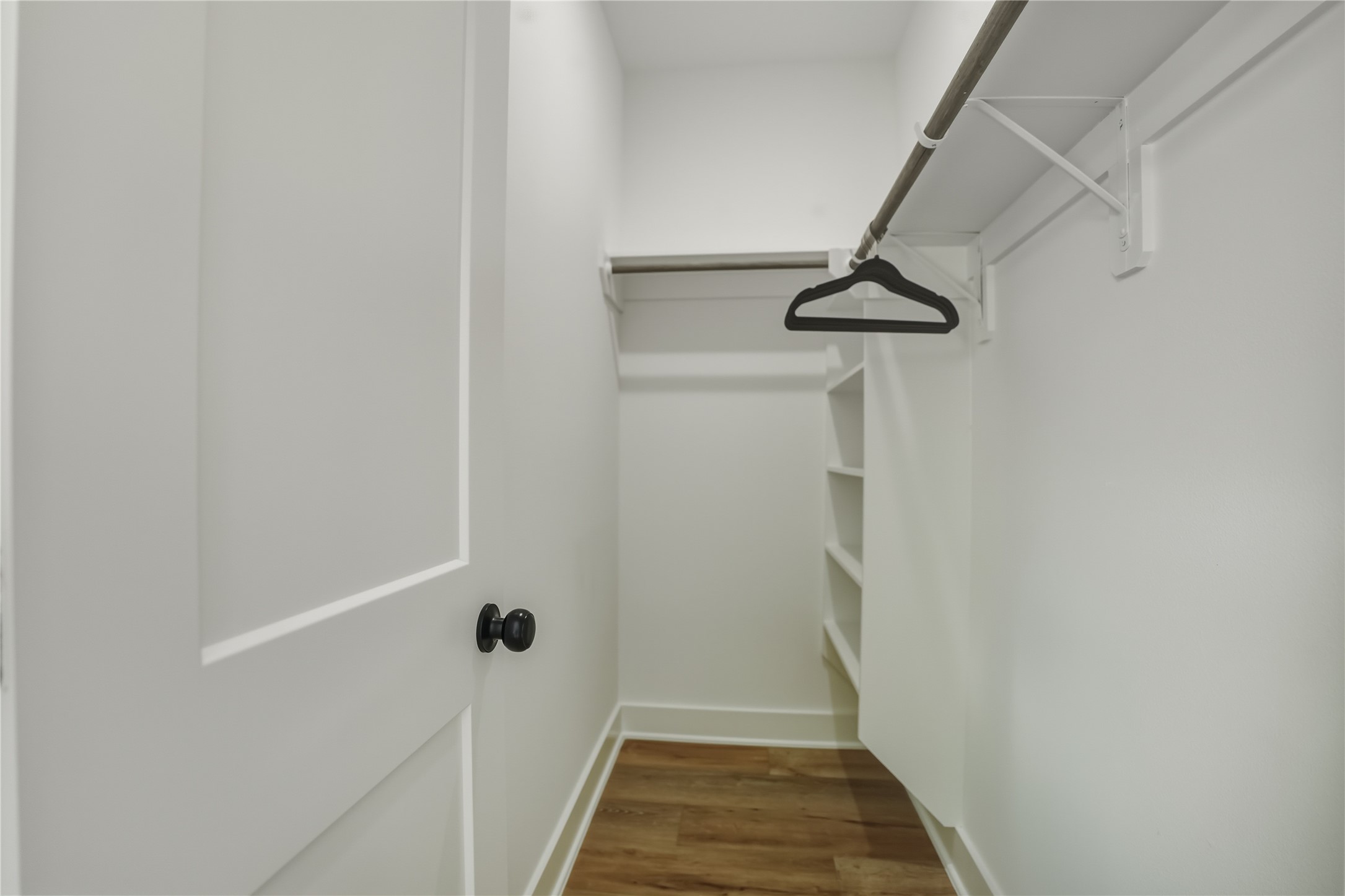 8017 Cora Street, Unit B Houston, TX 77088 - Photo 26 of 28 a view of a hallway with closet
