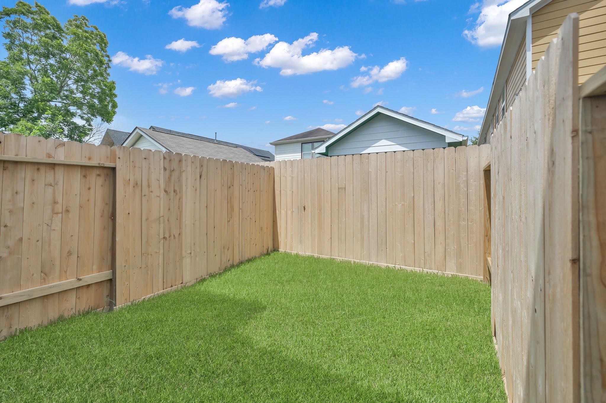 8017 Cora Street, Unit B Houston, TX 77088 - Photo 28 of 28 a view of backyard with cabin