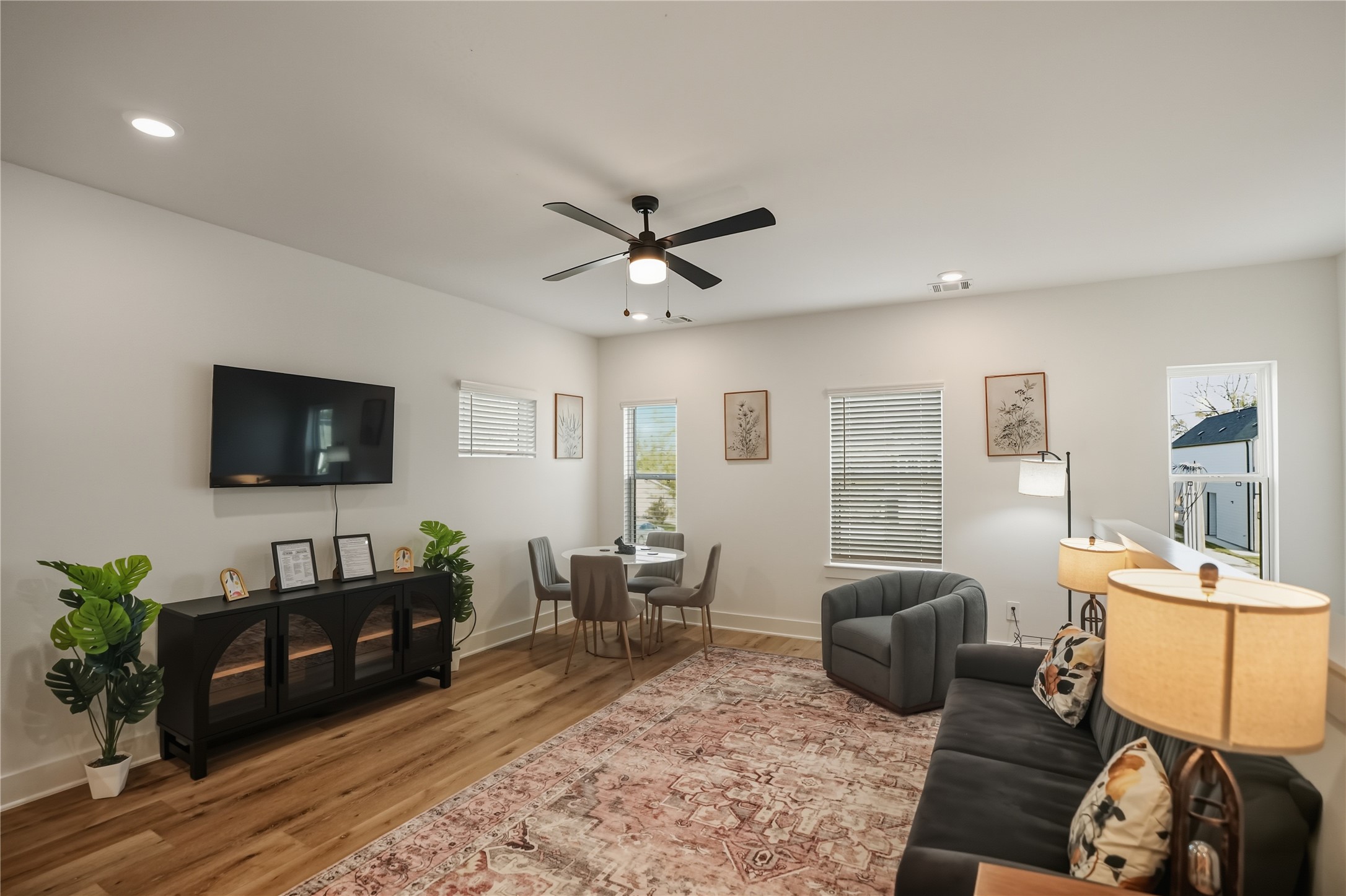 8017 Cora Street, Unit B Houston, TX 77088 - Photo 7 of 28 a living room with furniture and a flat screen tv