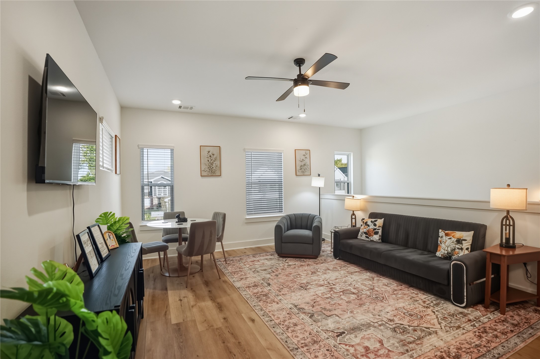 8017 Cora Street, Unit B Houston, TX 77088 - Photo 8 of 28 a living room with furniture and a wooden floor