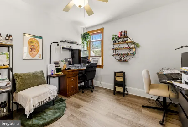 a bedroom with a bed and furniture