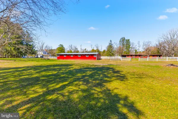 a view of swimming pool with an outdoor space and seating area