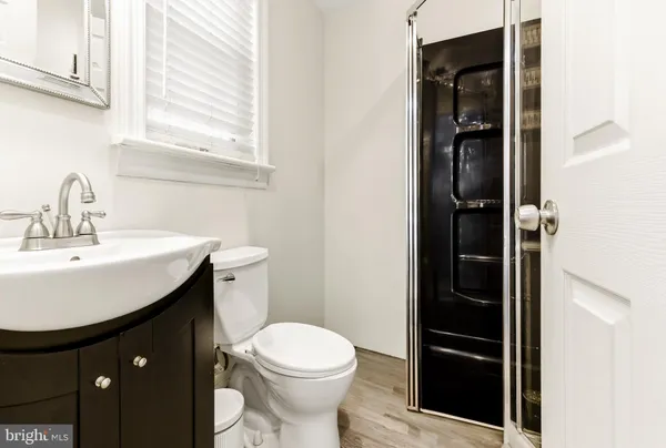a bathroom with a sink and a toilet