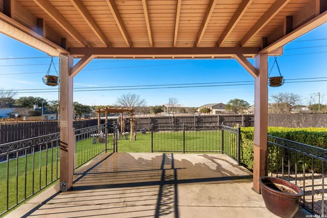 a view of deck with wooden floor and outdoor seating